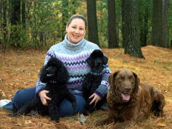 Julie with Ch. Enchantment's Pollie Pocket, Ch. Enchantment's Ace Wild and Wingmaster's One Tuff Customer